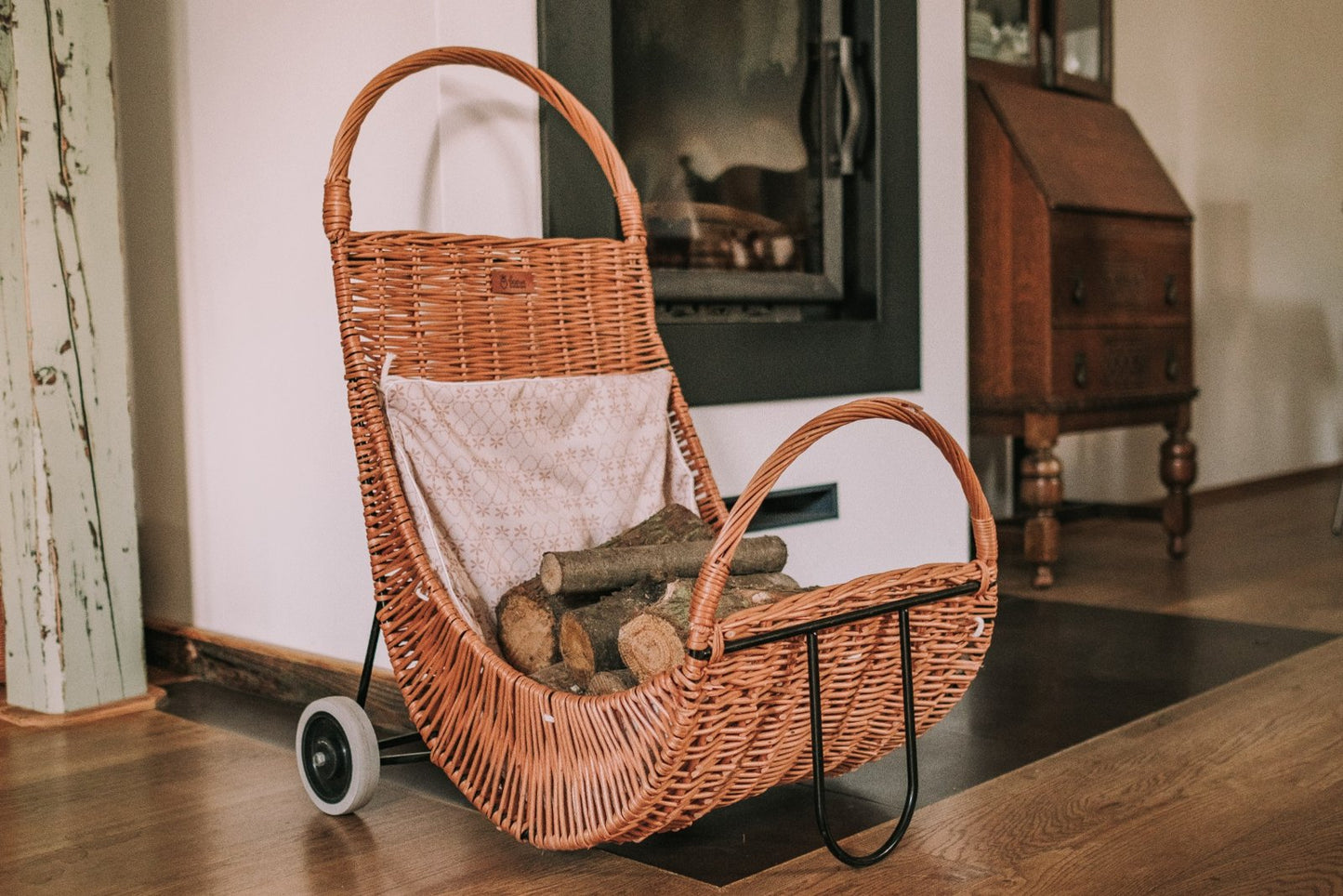 Quercus wicker firewood basket with cream trim, on casters TheWickerStories