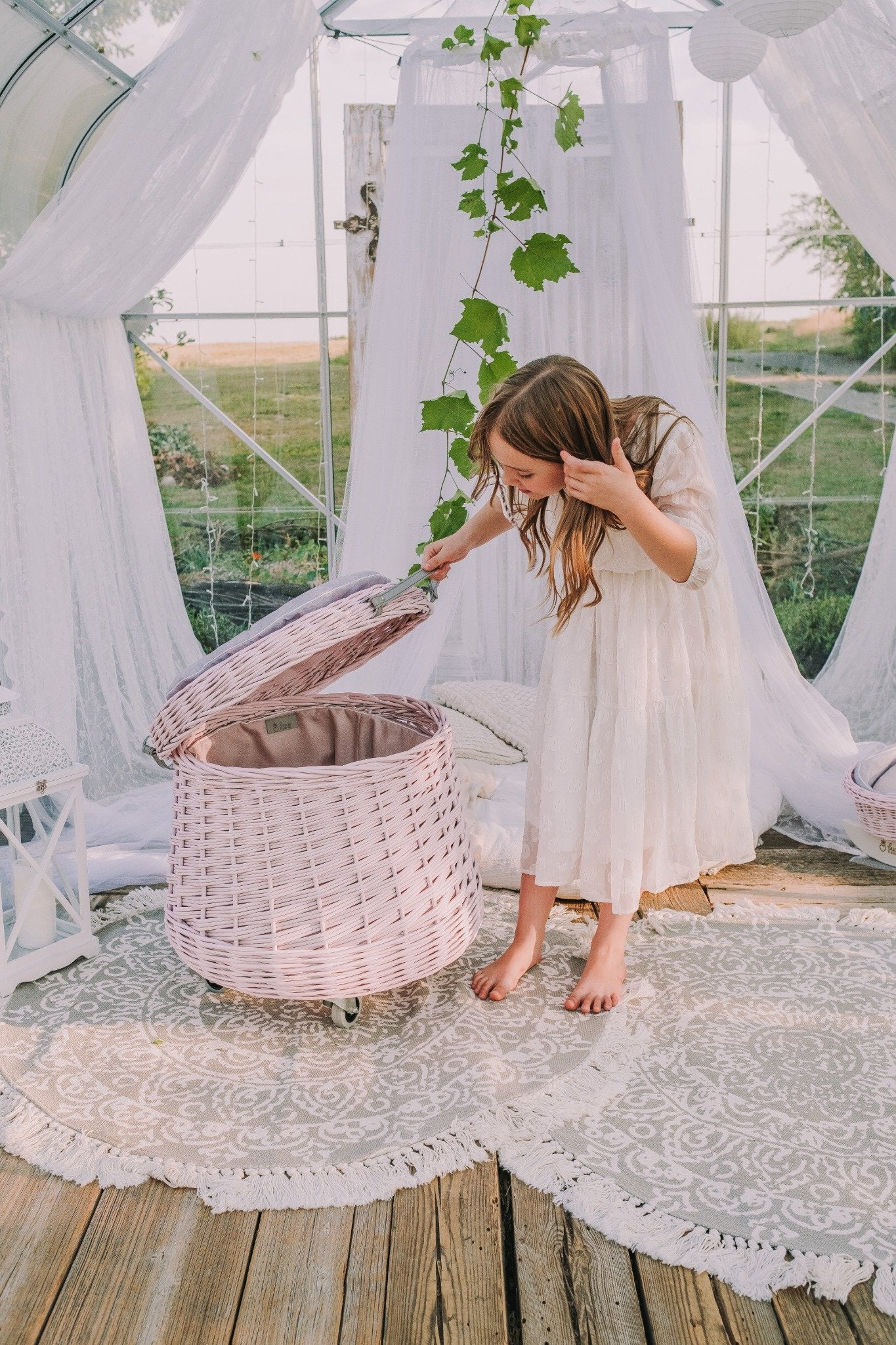 Vinca wicker toy chest for the kids' room with pink trim and wheels TheWickerStories