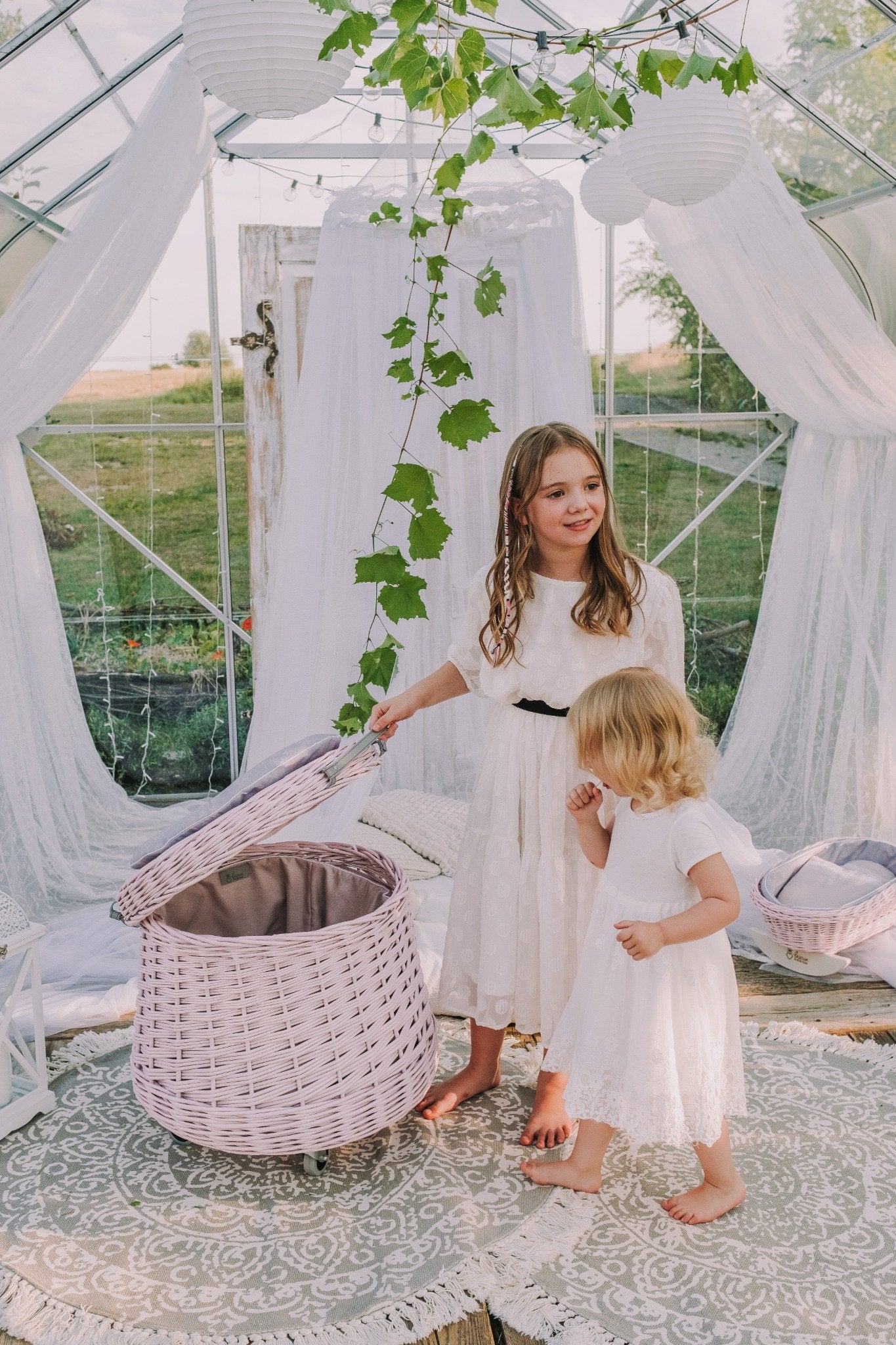 Vinca wicker toy chest for the kids' room with pink trim and wheels TheWickerStories