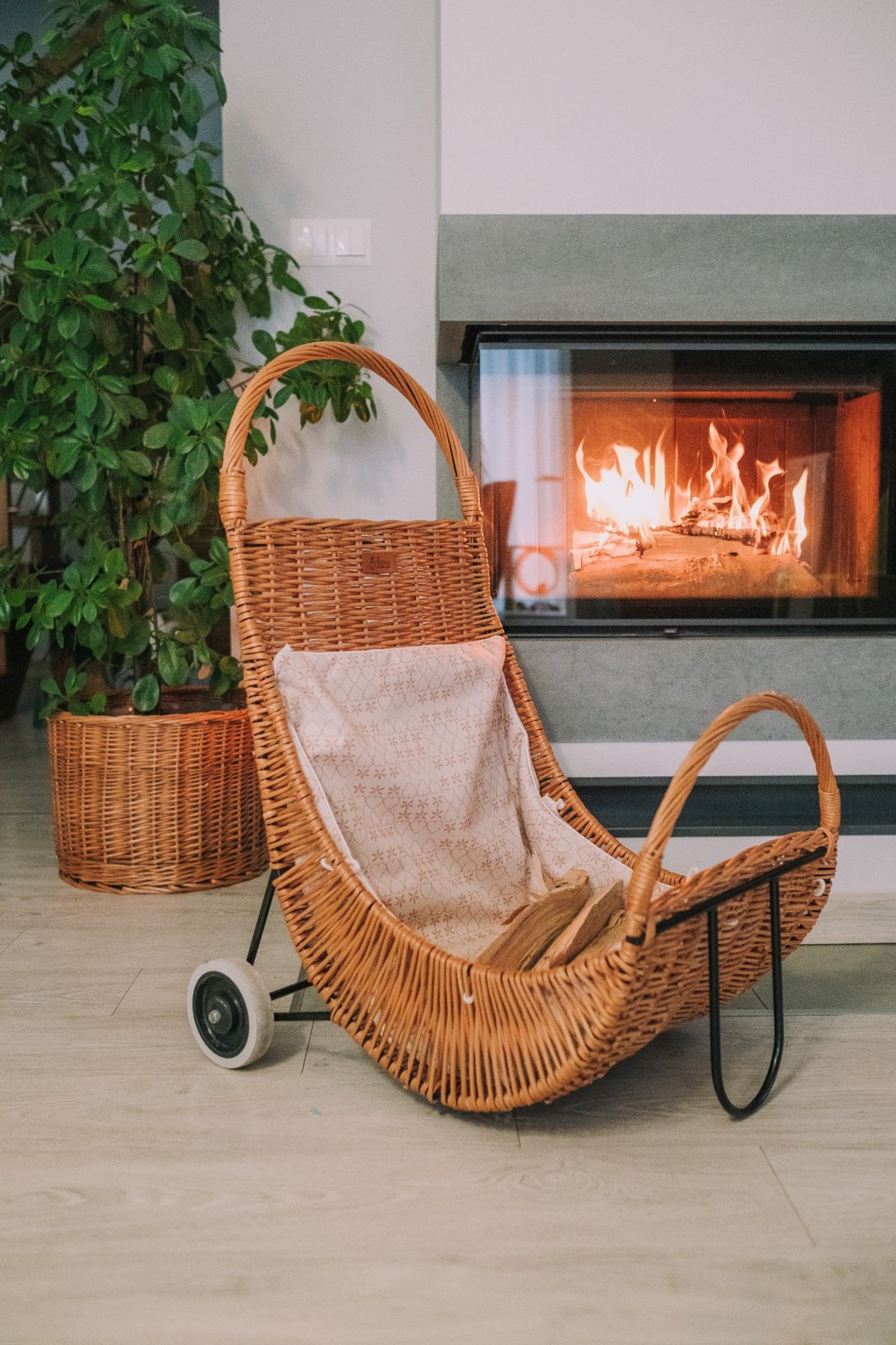 Quercus wicker firewood basket with cream trim, on casters TheWickerStories