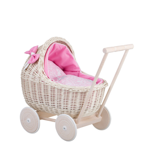 Lili wicker doll stroller with pink trim, blanket, and pillow