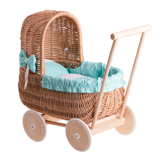 Lala wicker doll stroller with green trim, blanket, and pillow