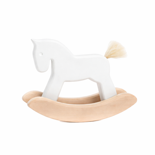 white wooden rocking horse - toy for children